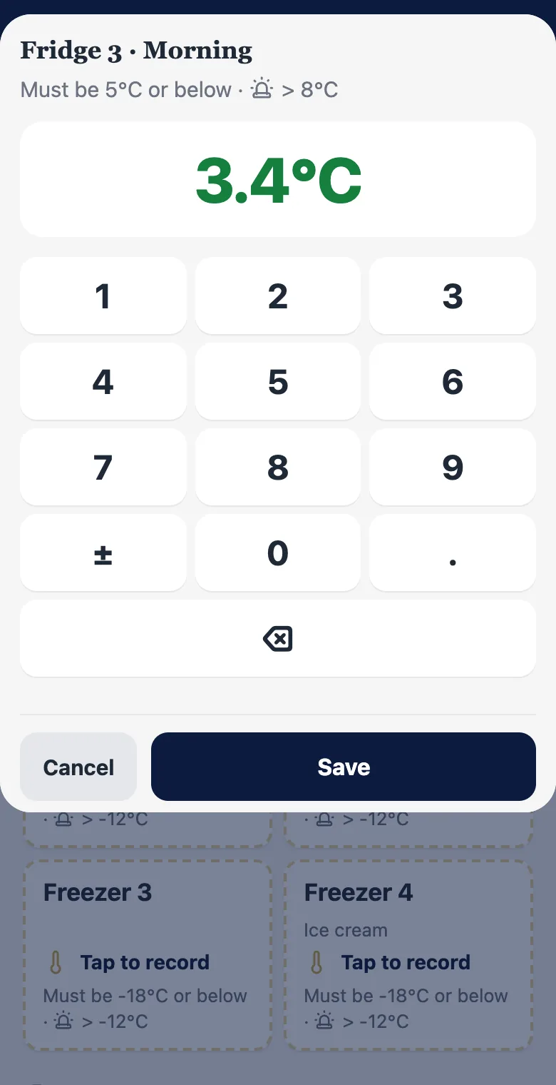 Typing a fridge temperature of 3.4°C on the number pad